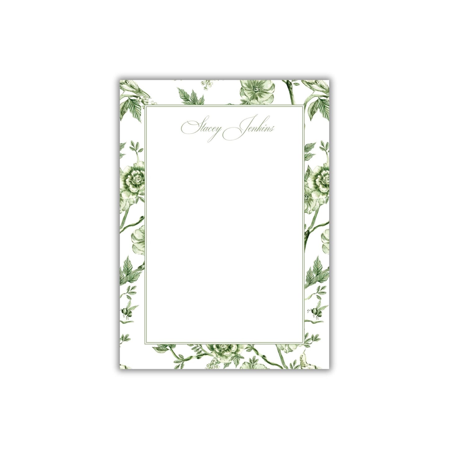 a card with a green floral design on it