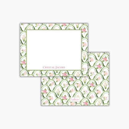 a set of greeting cards with a floral pattern and a blank space for writing a message.