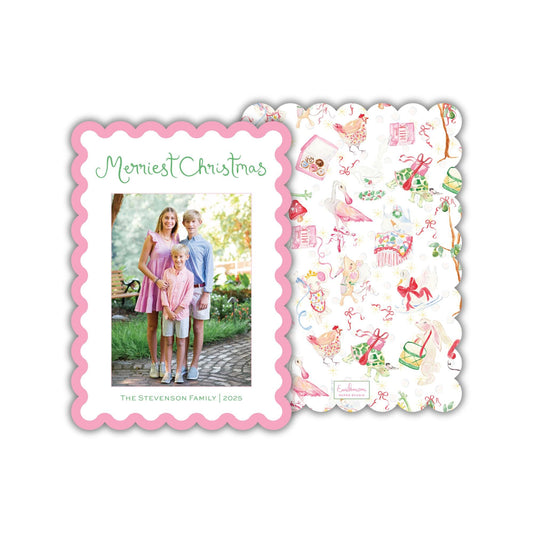 The image is a family photo with three children posing for a Christmas card. The card has a scalloped edge and a pink and white pattern, and the text &quot;Merry Christmas&quot; is displayed on the front.