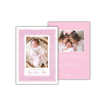 a pink card with a picture of two babies