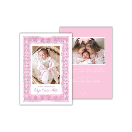 a pink card with a picture of two babies