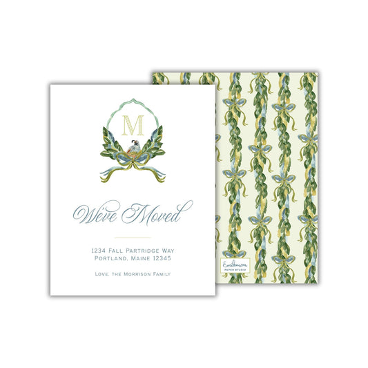 The image is a white card with a floral pattern and a monogrammed letter &quot;M&quot; on it. The card announces that someone has moved to 1234 Fall Partridge Way in Portland, Maine, and invites the recipient to love the Morrison family.