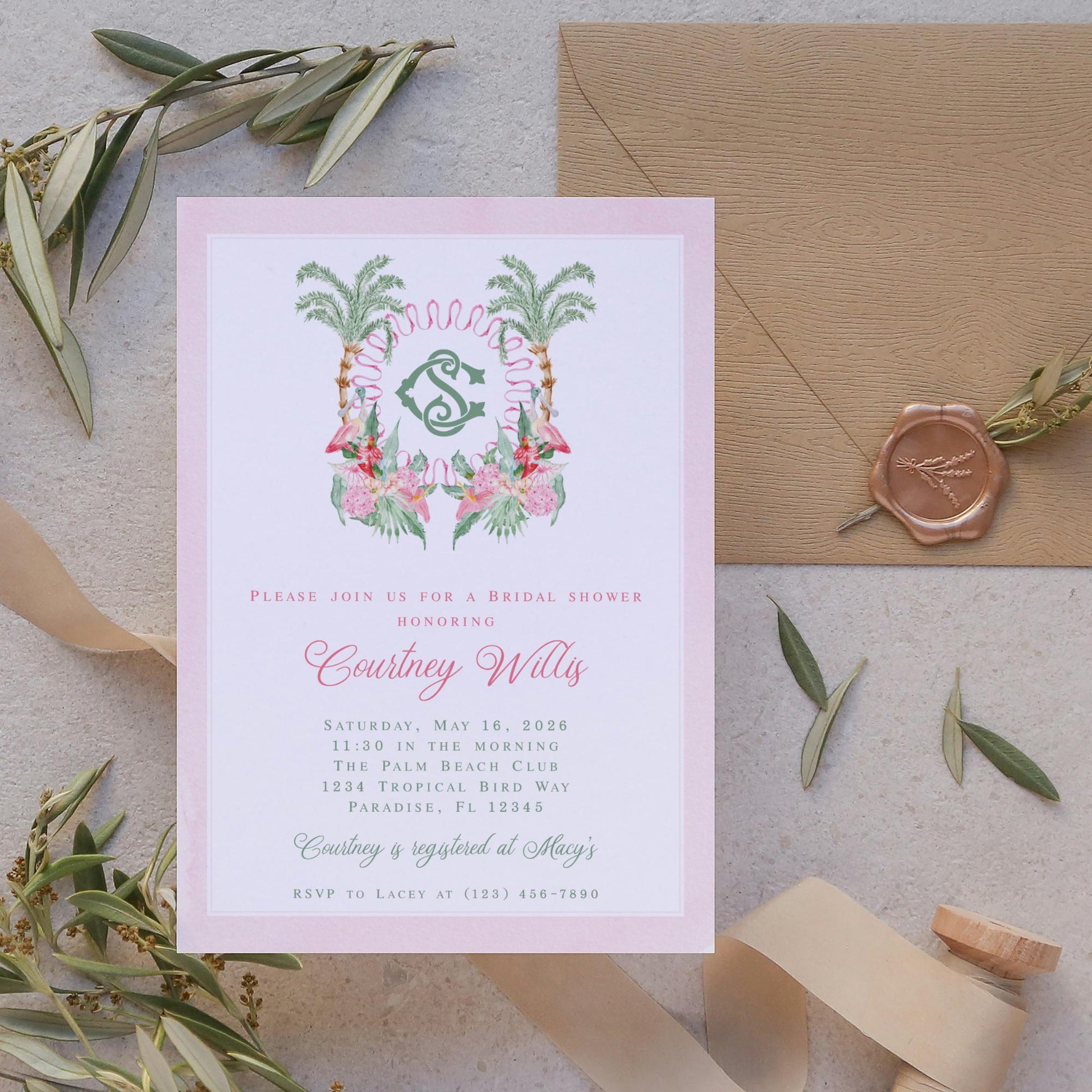 A pink invitation card for a bridal shower, featuring a floral design and the initials 'C&W' on the front.