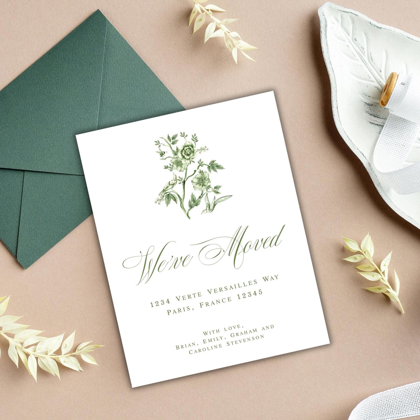 a wedding card with a floral design on it