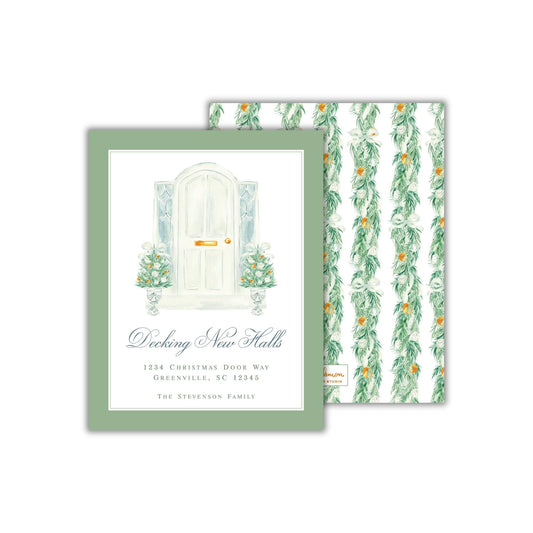 The image is a green and white card featuring a white door with a floral design, surrounded by greenery. The card has a textured background with a repeating pattern of green leaves and orange flowers. The text on the card reads &quot;Decking New Halls 1236 Christmas Door Way GREENVILLE, SC 12345 THE STEVENSON FAMILY&quot;.