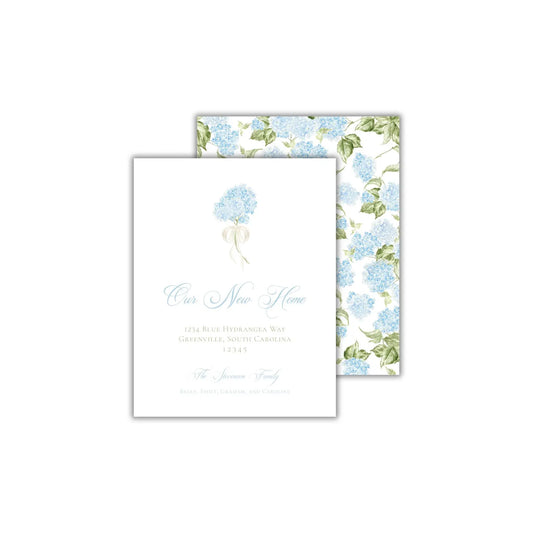 a wedding card with blue flowers on it