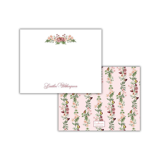 two separate items: a white square with a floral design on the top left corner and a pink square with a floral pattern on the bottom right corner.