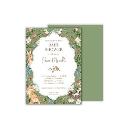 A 5 x 7 rectangular baby shower invitation, with a green background overlaid with hand-painted watercolor artwork of woodland animals and greenery. A wavy oval in the center features relevant baby shower text. The back of the invitation is a solid soft green to match the front.
