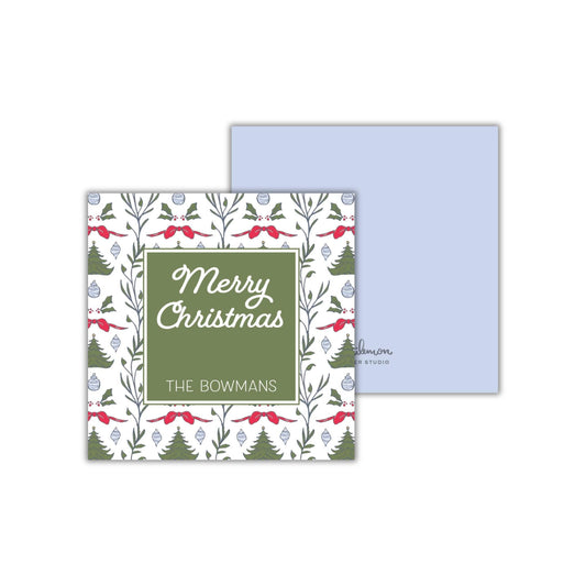 A Christmas card with a floral pattern and the text "Merry Christmas" in the center.