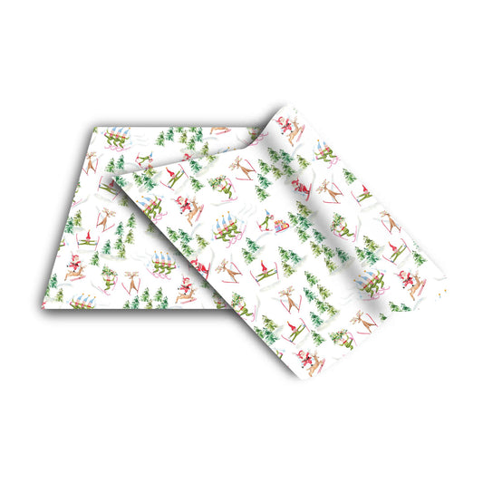 a pair of white wrapping paper with christmas trees on them