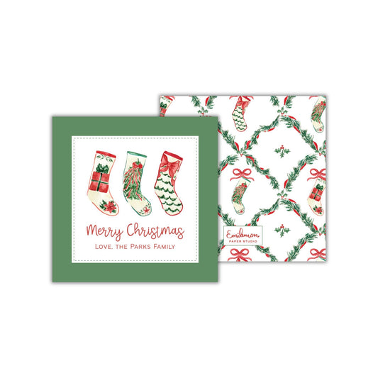two Christmas-themed items: a green square card with a festive design and text, and a white square card with a repeating pattern of Christmas stockings and greenery.