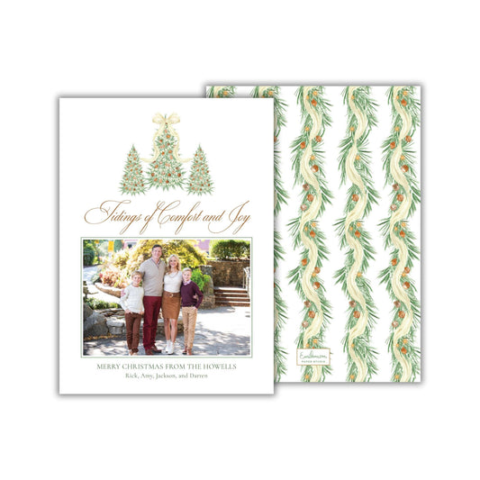 The image is a Christmas card featuring a family photo and a Christmas wreath design.