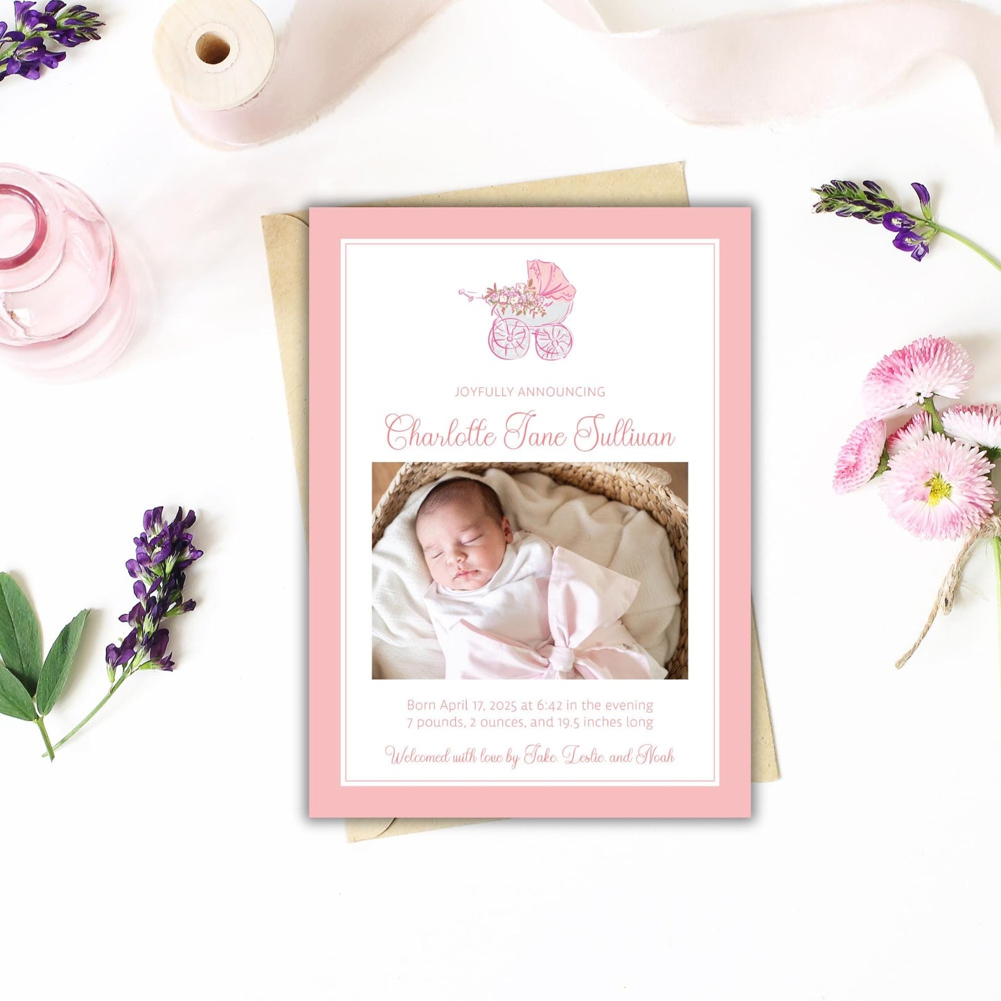 a birth announcement card with a photo of a baby