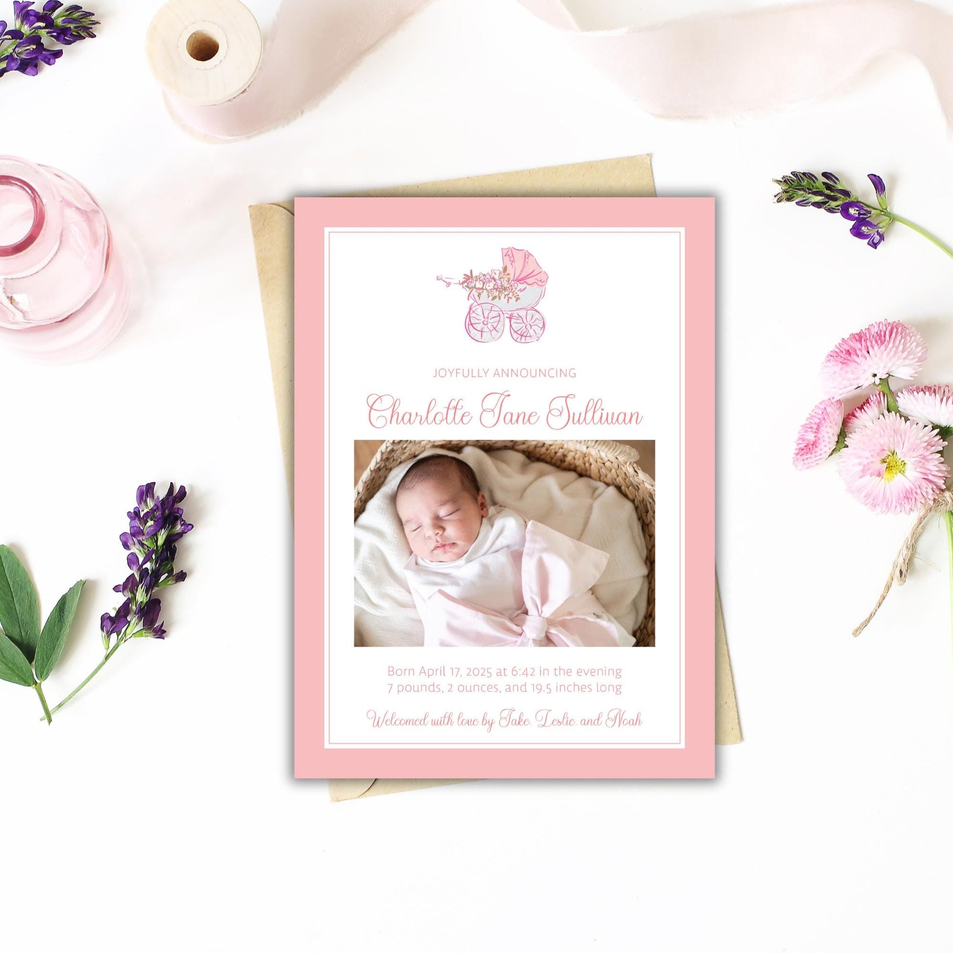 a birth announcement card with a photo of a baby