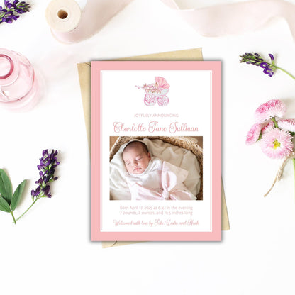a birth announcement card with a photo of a baby