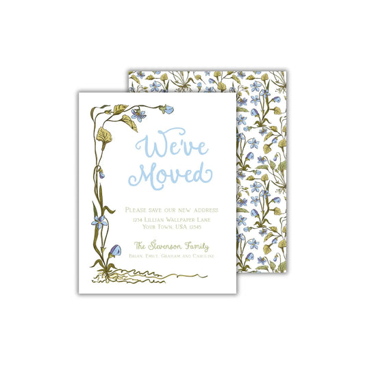 a wedding card with blue flowers on it