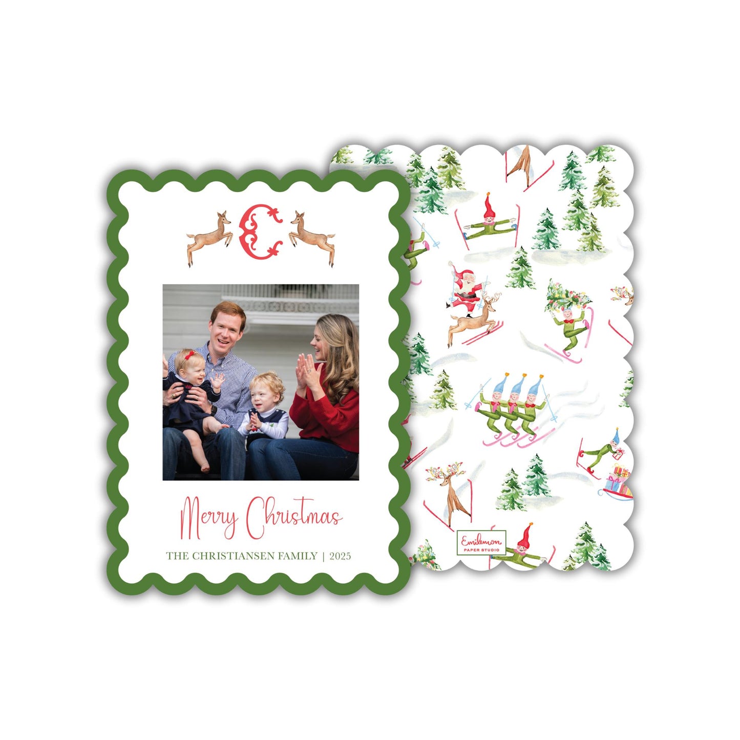 A Christmas card featuring a family photo and a winter scene with snow and reindeer.