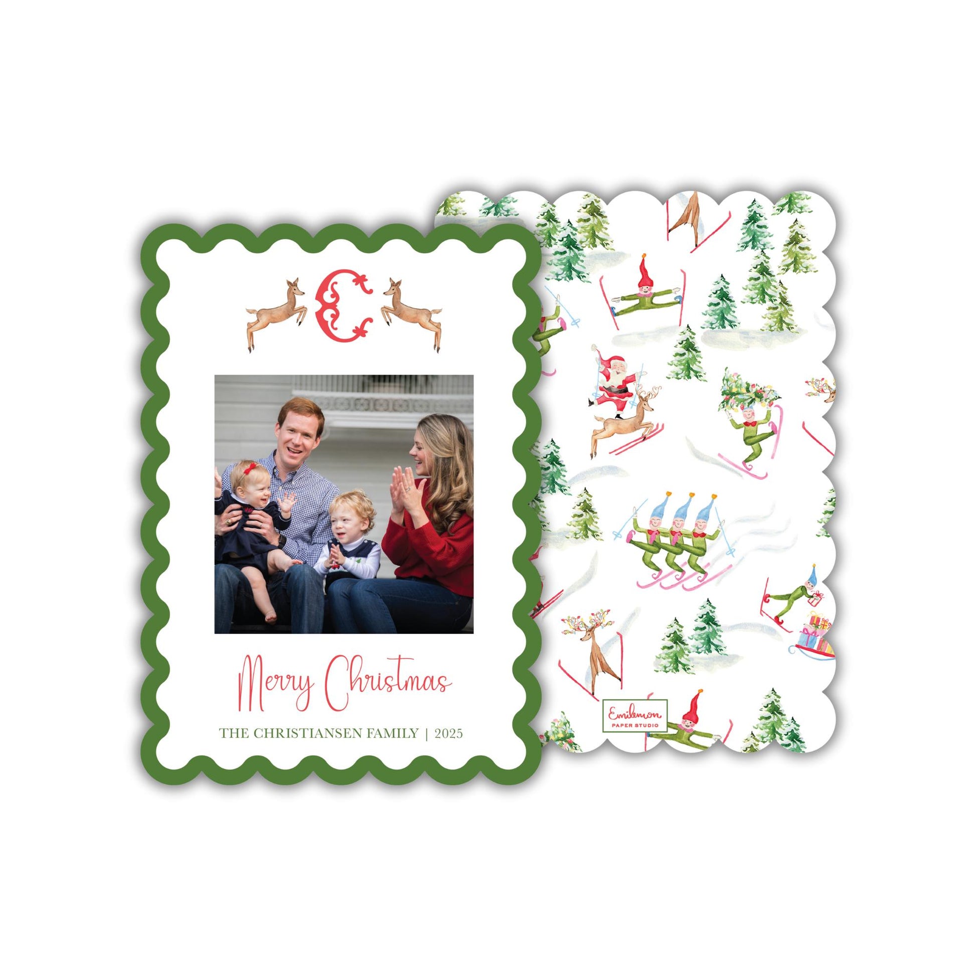 A Christmas card featuring a family photo and a winter scene with snow and reindeer.