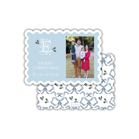 A family photo is displayed on a Christmas card with the text &quot;Merry Christmas The Edwards Family&quot;.
