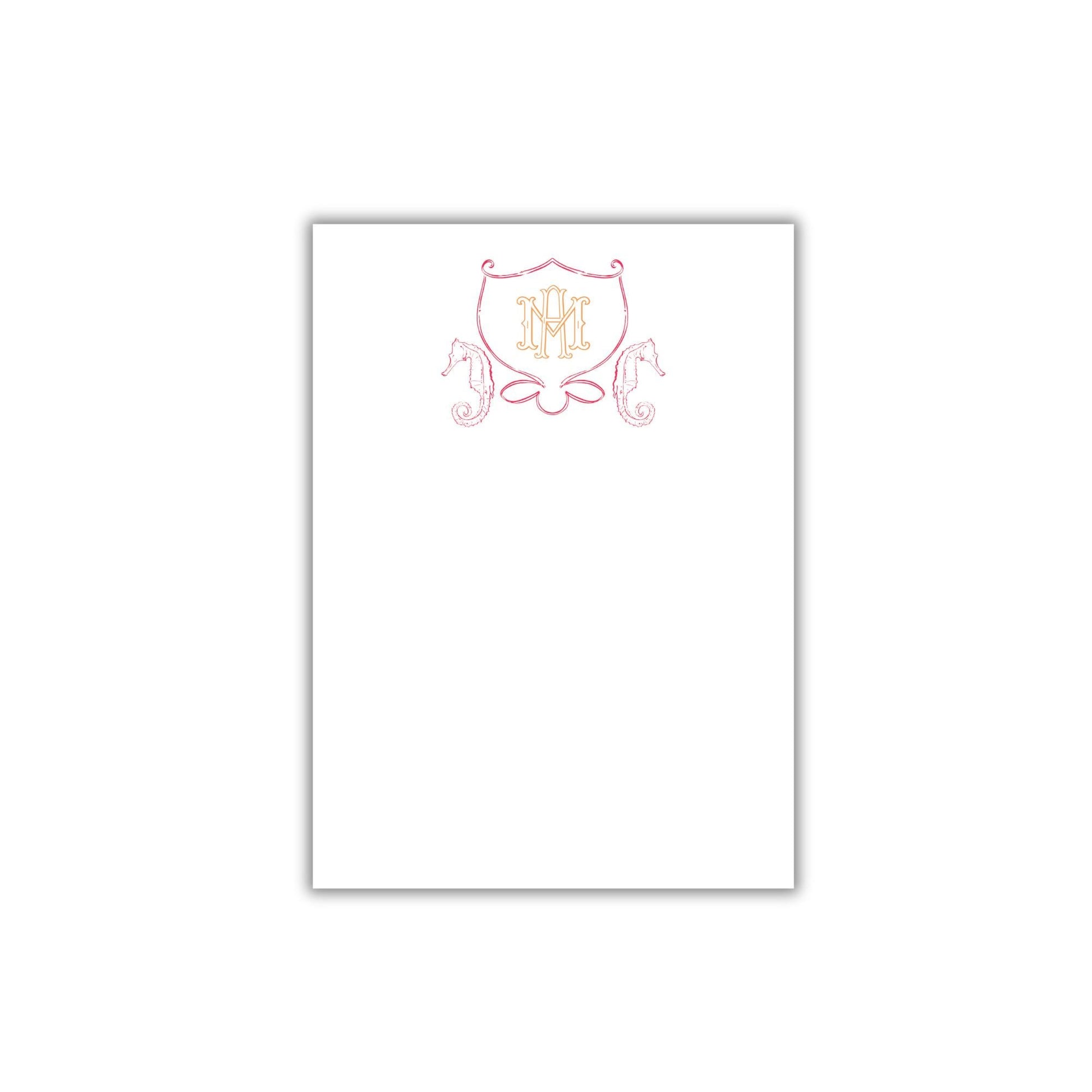 a white paper with a pink and red design on it